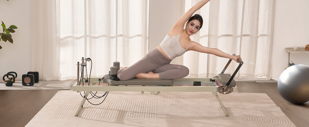 SucceBuy Foldable Pilates Reformer Pilates Workout Machine for Home Gym Studio Use Pilates Bed with Dual Resistance-Spring&Cord